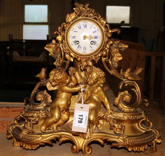 A Louis XV style gilt metal eight day mantel clock by Marshall & Sons, Paris(-)